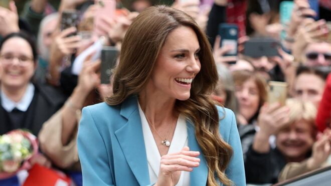 Catherine, Princess of Wales, gestures as she arrives at the city hall on the first day of her visit to Reggio Emilia