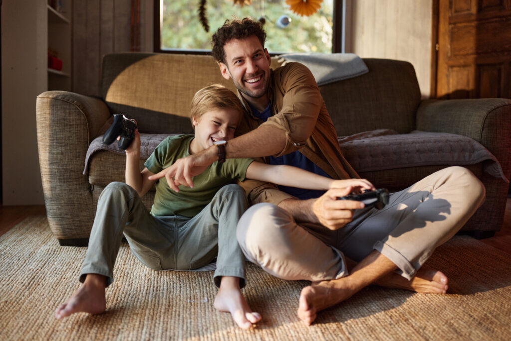 dad and son playing