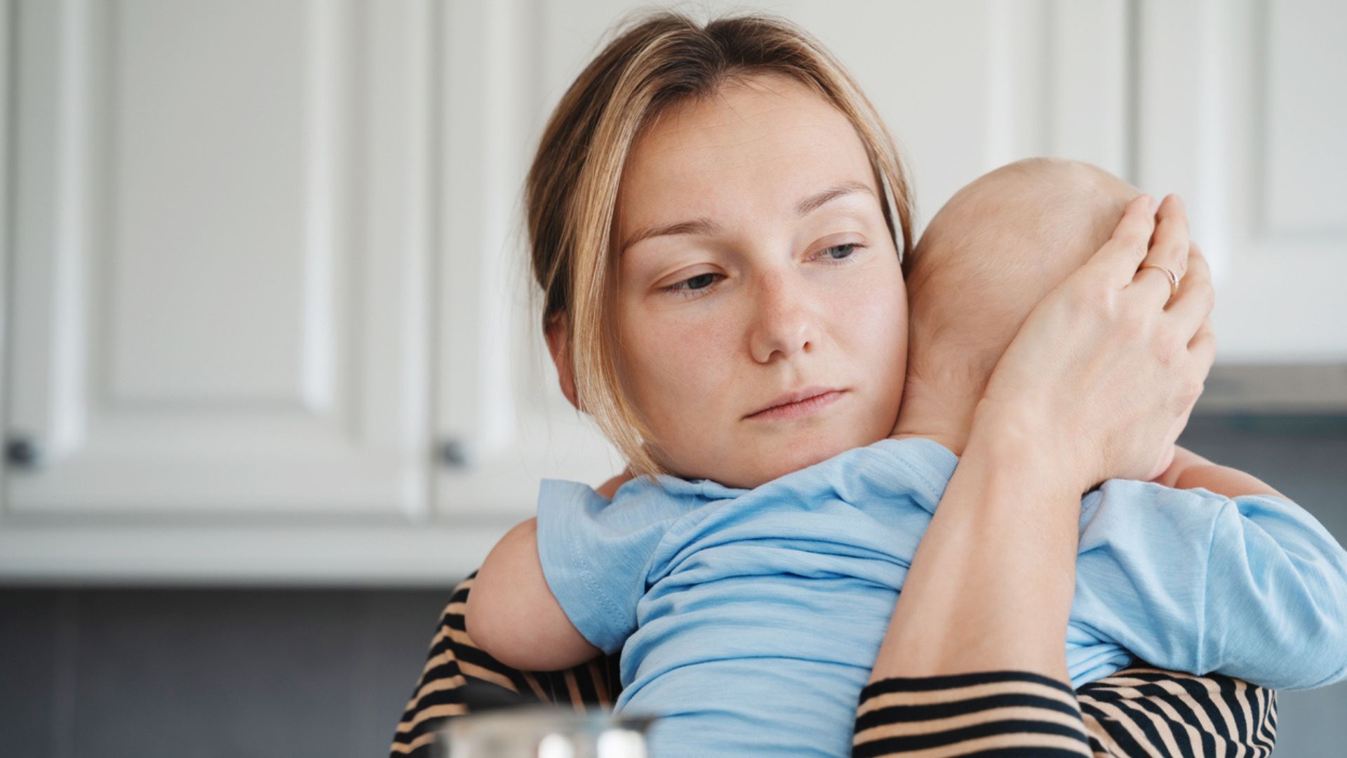 A loving mom holding her baby