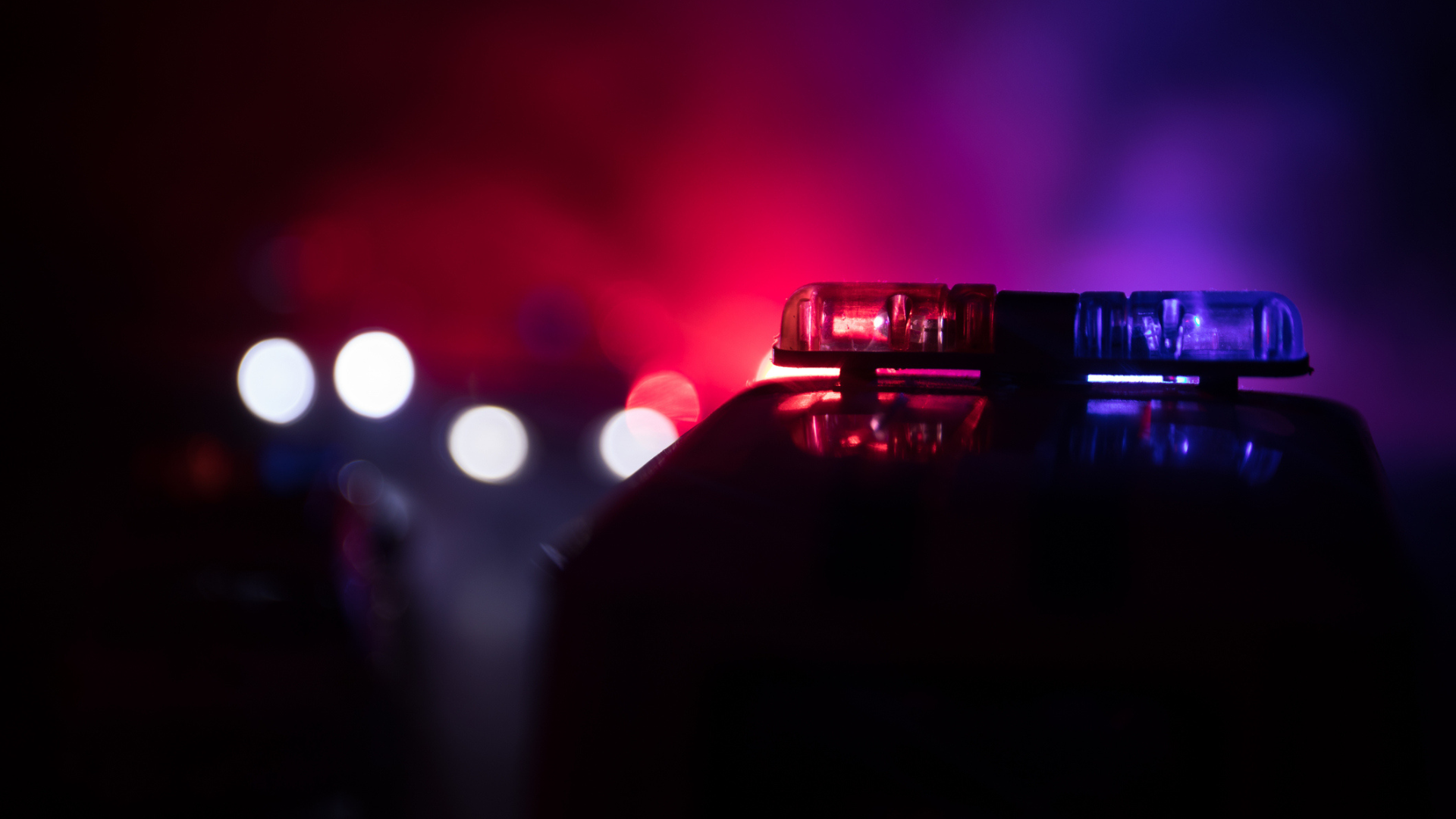 police cars with sirens