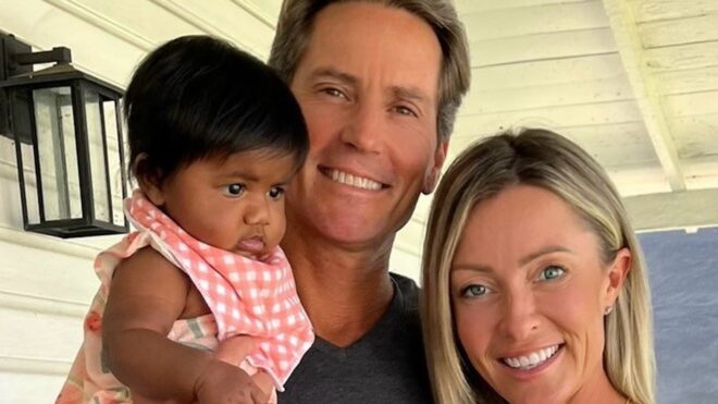 Tiffany Score and Steven Mills with their daughter