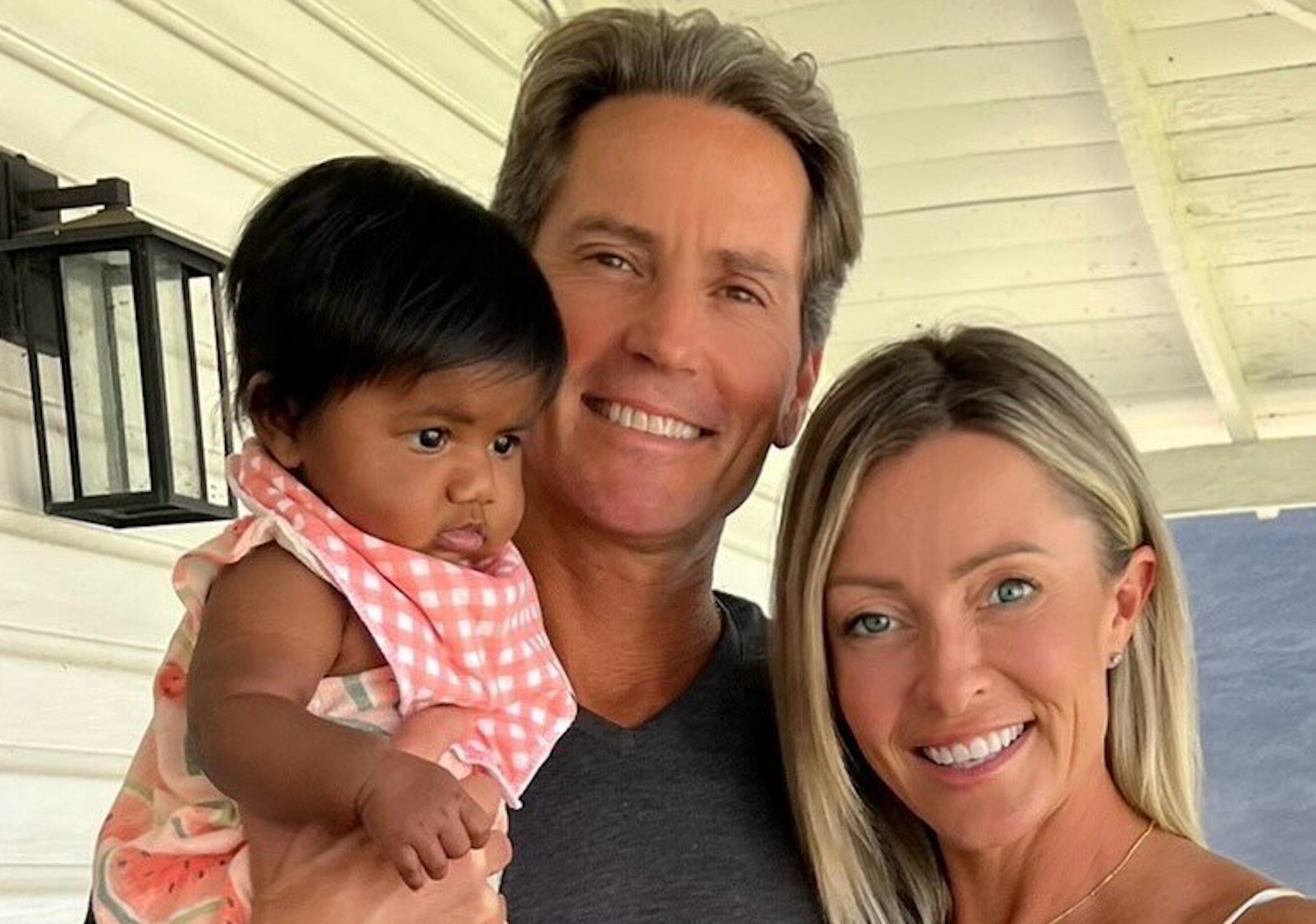 Tiffany Score and Steven Mills with their daughter