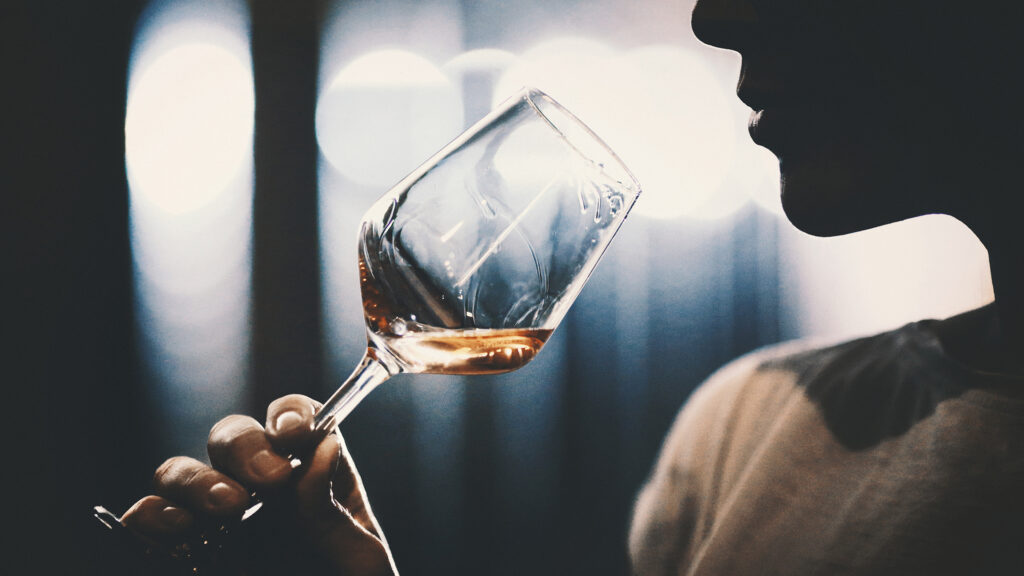 woman drinking wine - alcoholism sobriety