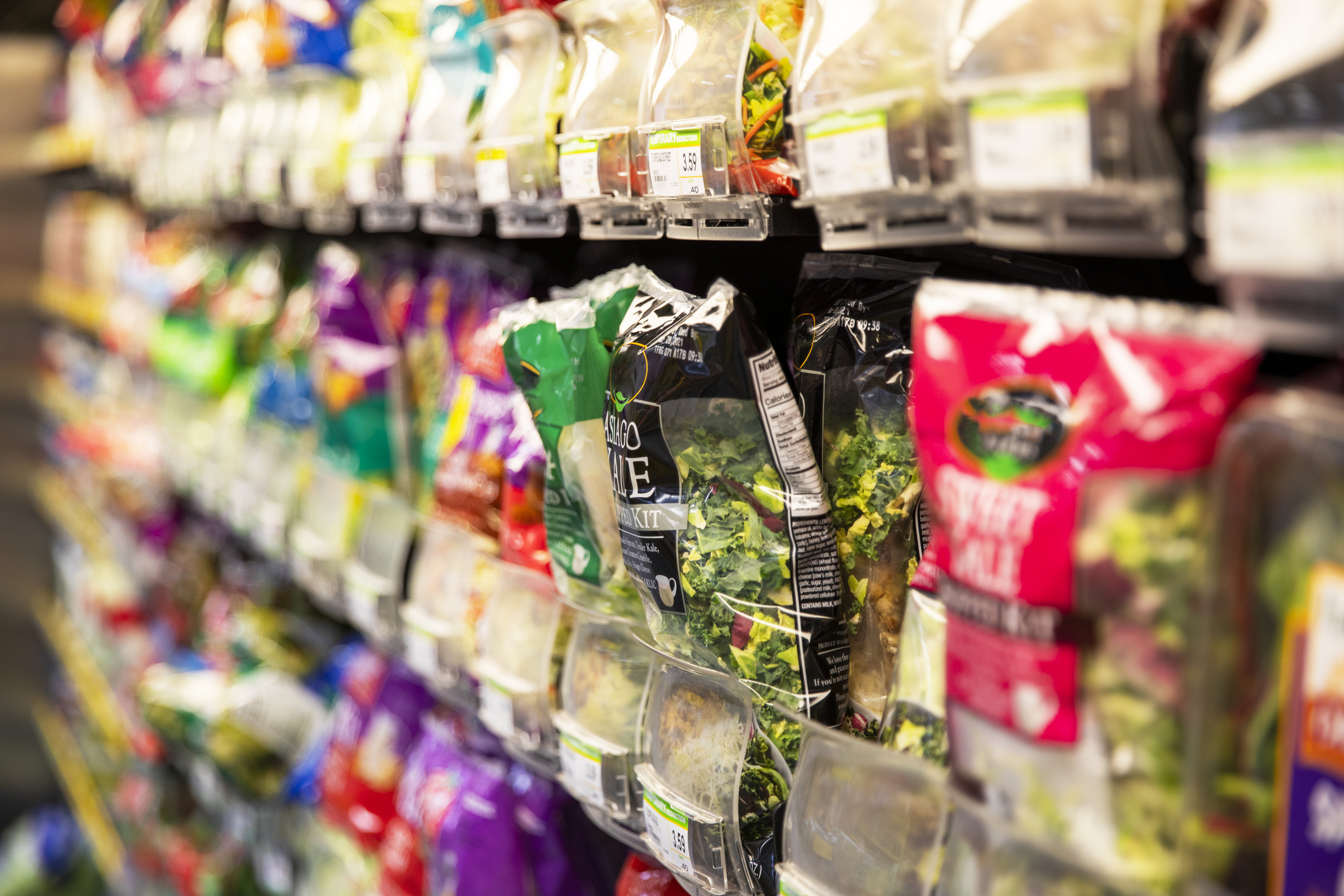 Food and beverage products in plastic packaging shot in a supermarket