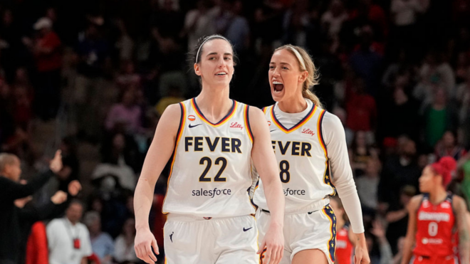 Caitlin Clark #22 of the Indiana Fever celebrates with Sophie Cunningham #8 after scoring the game-winning three pointer during the second half against the Washington Mystics at CareFirst Arena on June 08, 2026